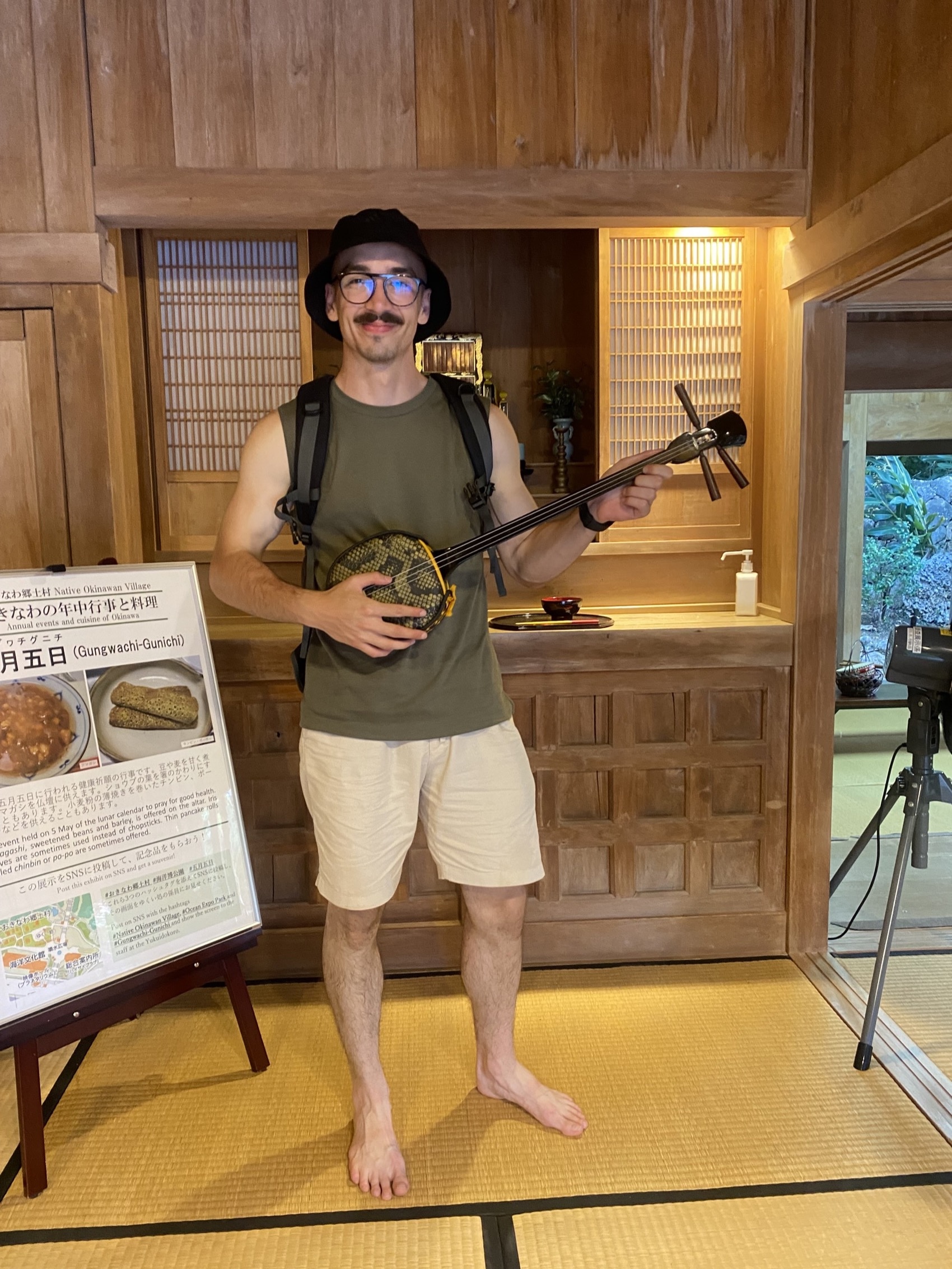 Maros Gorny holding a Sanshin in Japan