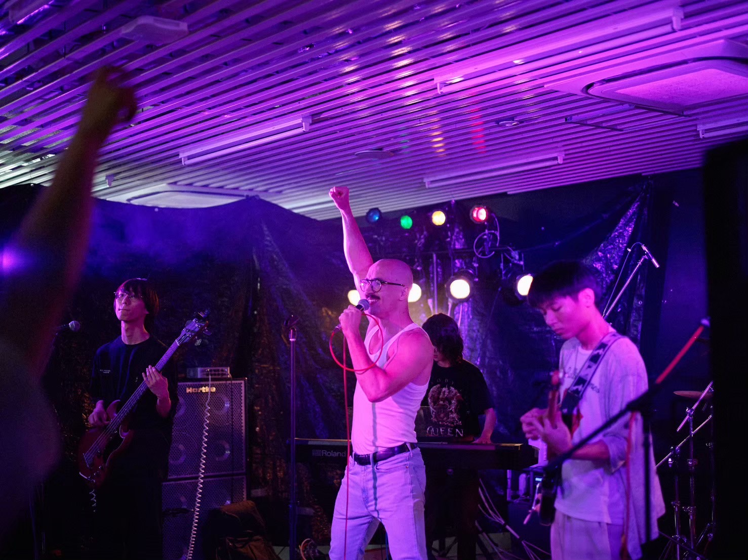 Maros Gorny singing with Slovak Rhapsody on stage in Japan